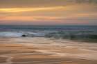 USA, New Jersey, Cape May National Seashore. Ocean shore and waves at sunrise. Art Print